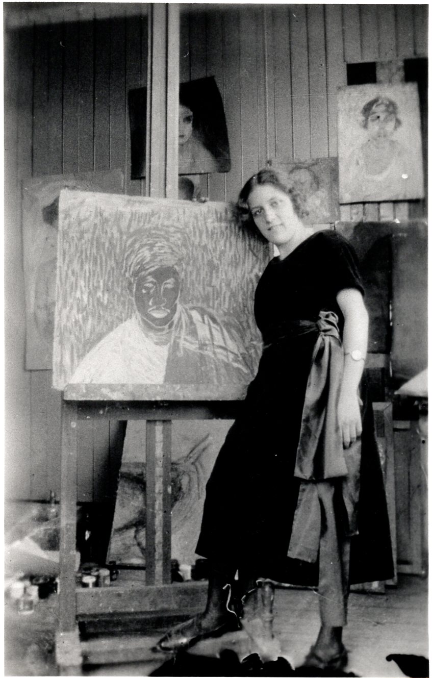 Rosario Cabrera painting in her studio, circa 1920.